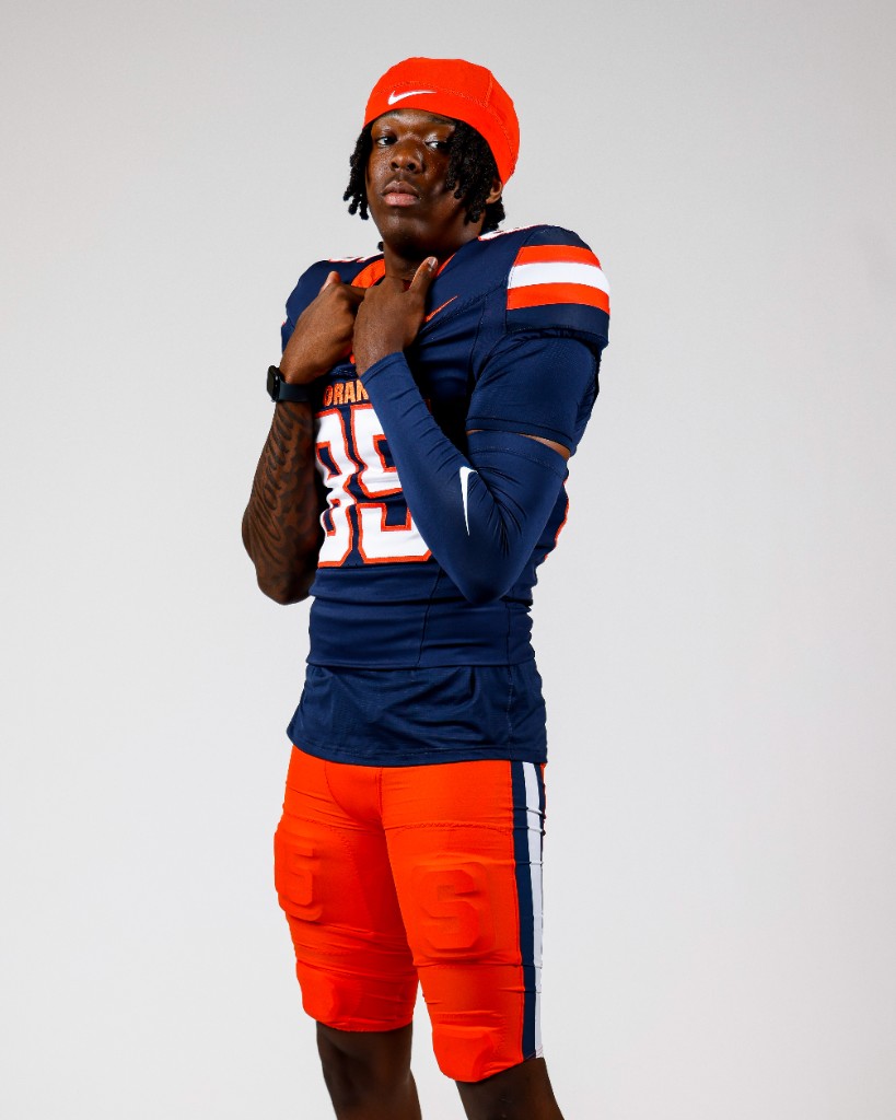 BJ Garrett in his Syracuse uniform on a studio backdrop